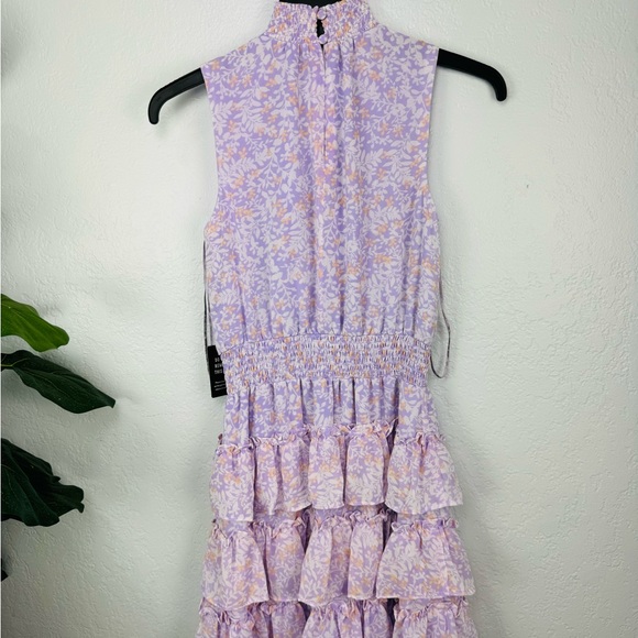 Express Printed Sleeveless Mock Neck Tiered
Ruffle Dress in lilac Purple Print - Picture 7 of 9